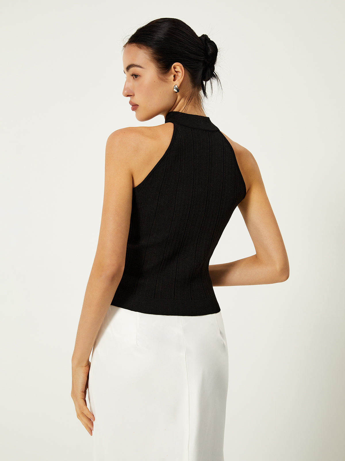 Top met asymmetrische knoopsluiting