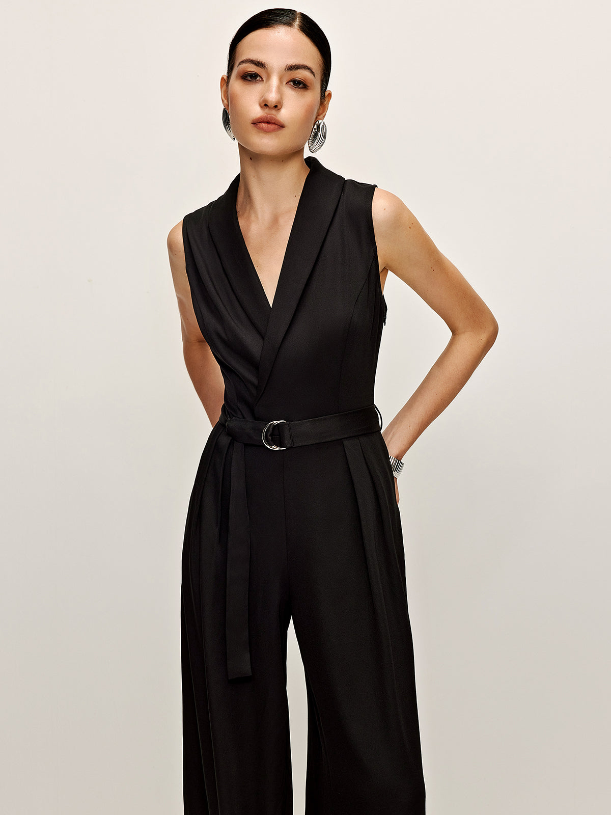 Effen mouwloos jumpsuit met riem