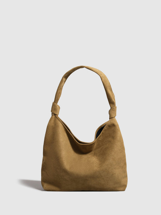 Geknoopte suède handtas